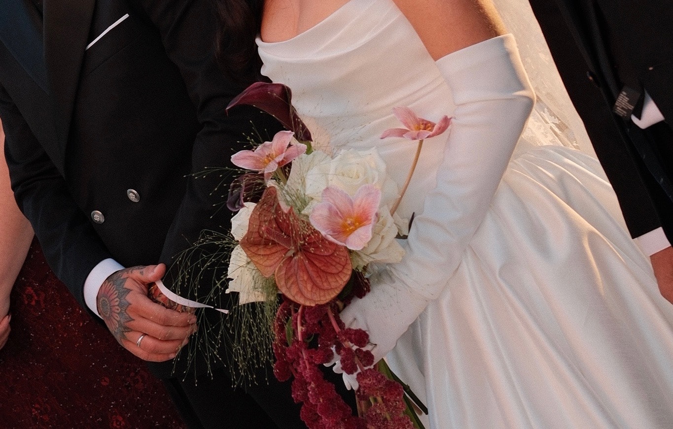 Bouquet and wedding attire detail