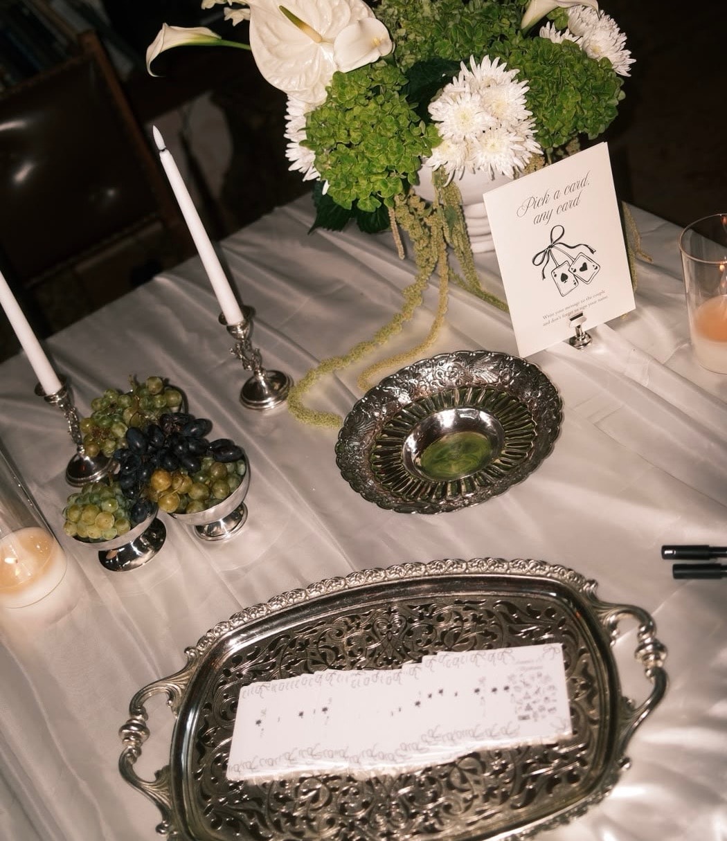White floral table detail with candlesticks